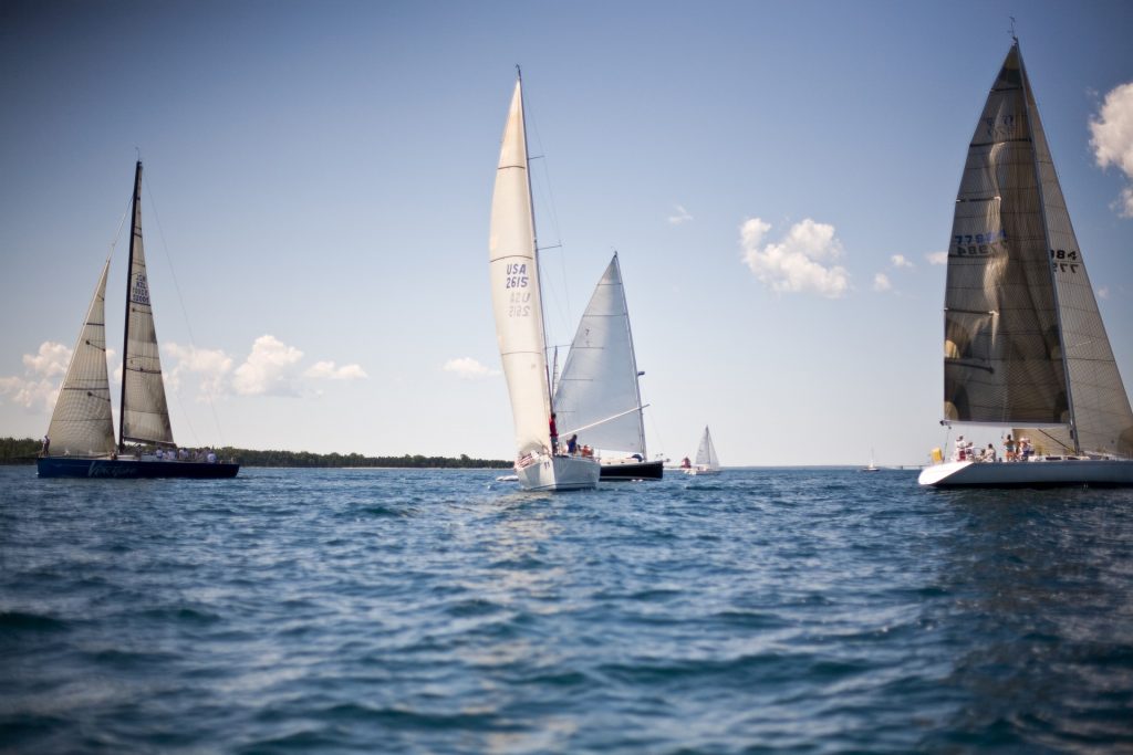Three sailboats at sea, what to consider when buying one?