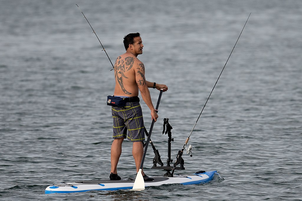 Mab fishing on a paddle board