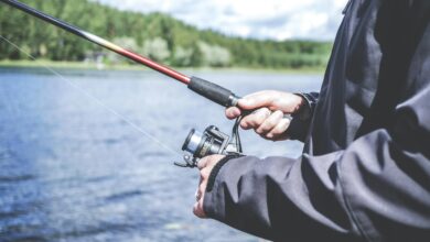 man holding a fishing rod